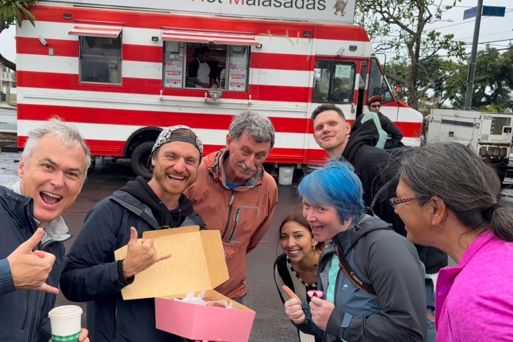 Group enjoying Leonards Malasadas